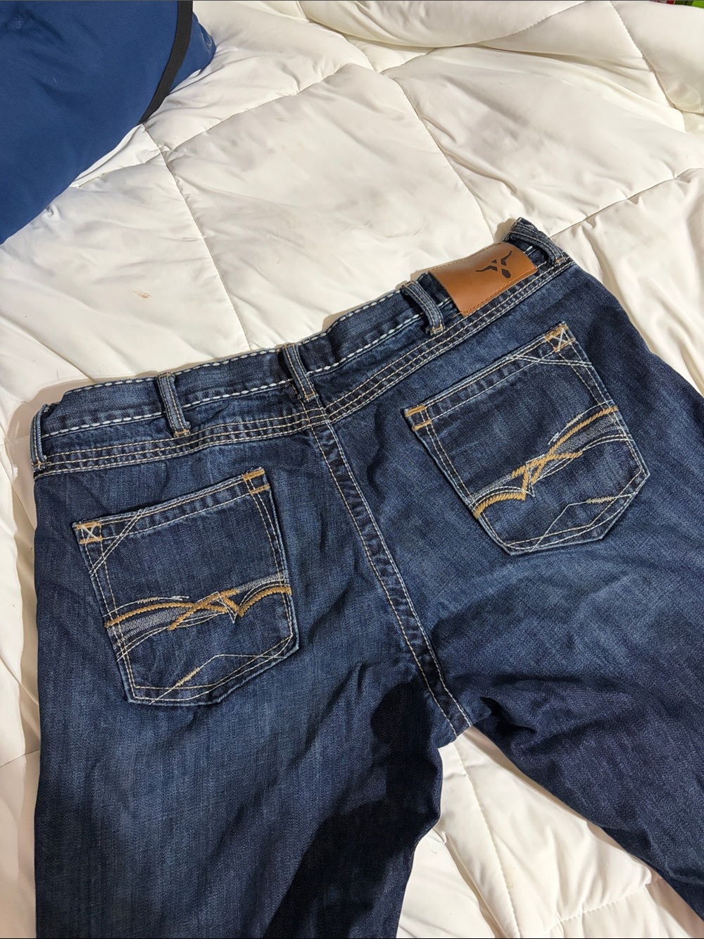 Wrangler Dark Blue Relaxed Fit Jeans with Embroidered Back Pockets